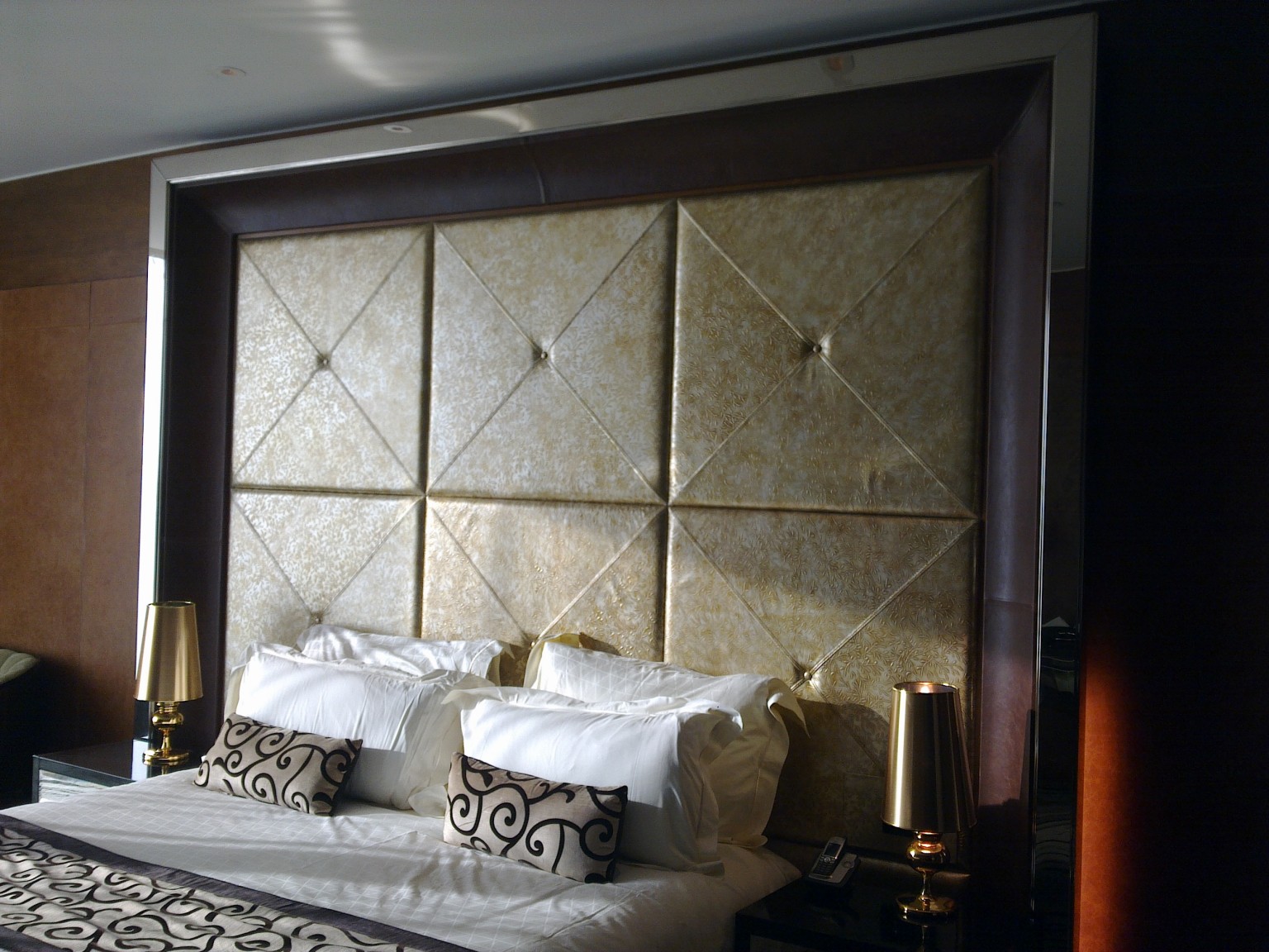 Gold Foil Leather On Headboard In Meydan Suite 2 Townsend Gold Foil Leather On Headboard In Meydan Suite 2